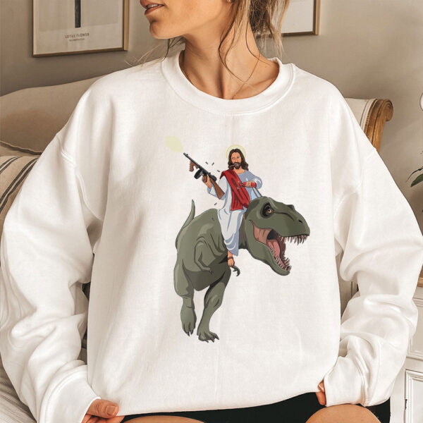 jesus riding a dinosaur sweater