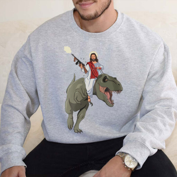 jesus riding a dinosaur sweater