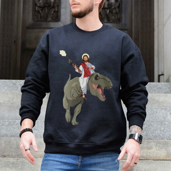 jesus riding a dinosaur sweater